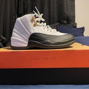 Nike Air Jordan 12 in Black and White with Gold Details